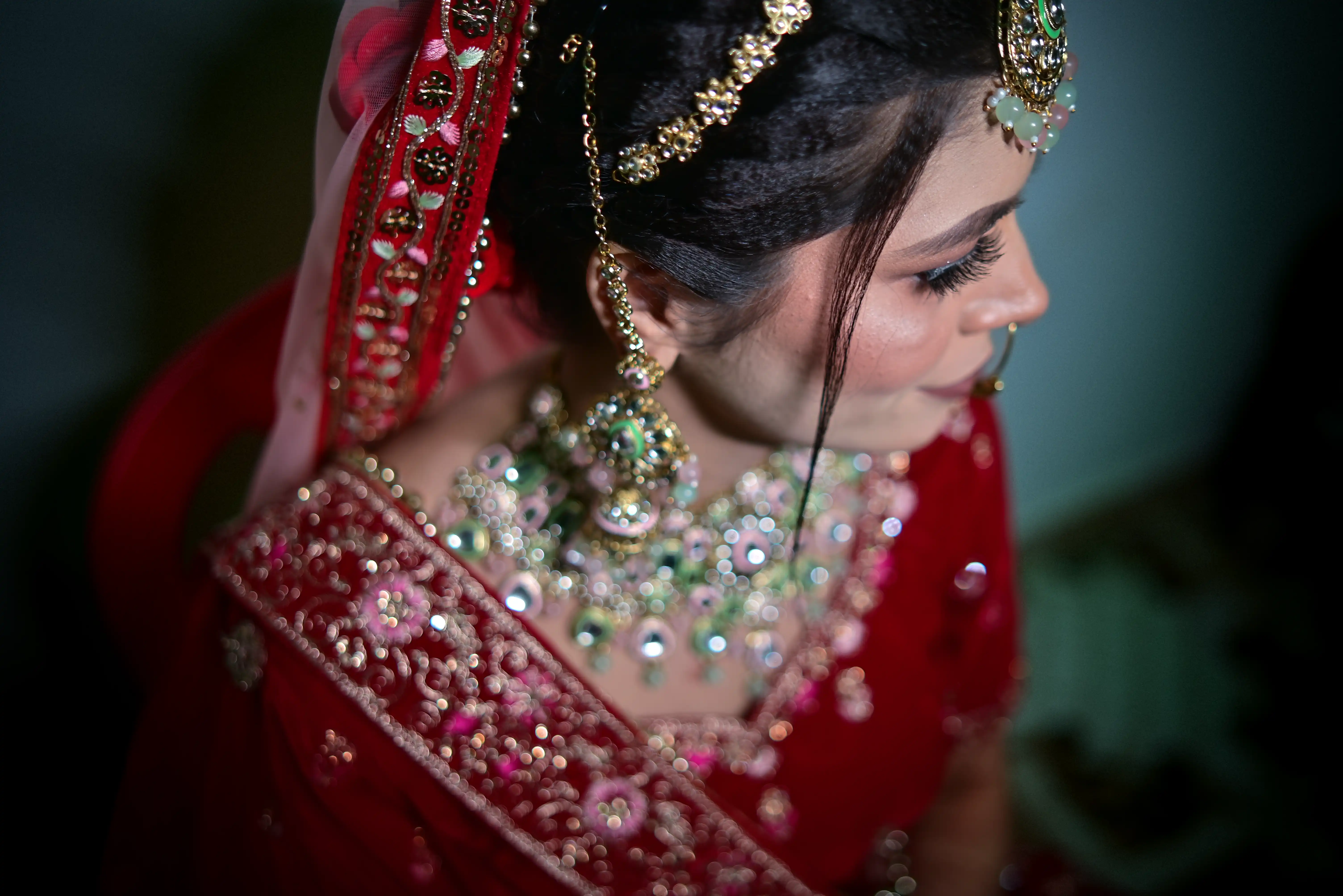 Bride looking at her reflection in the mirror