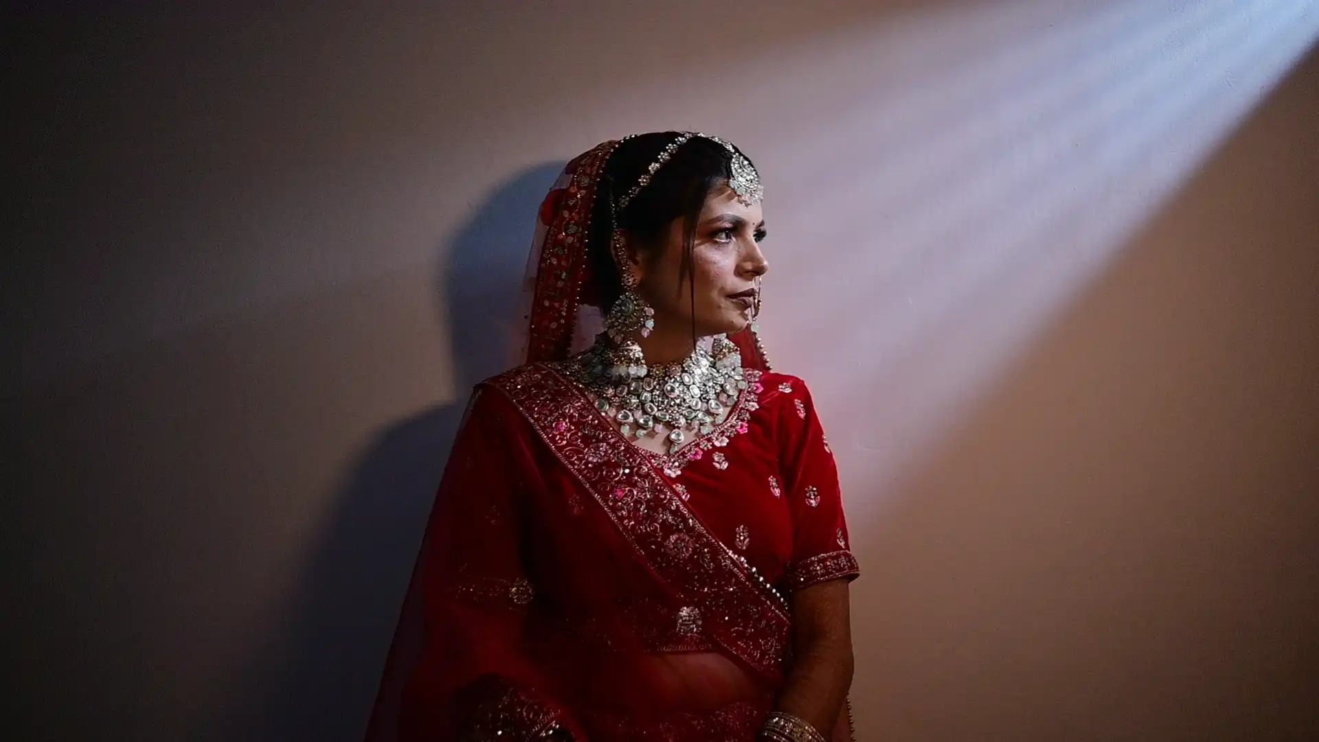 Groom adjusting his sherwani