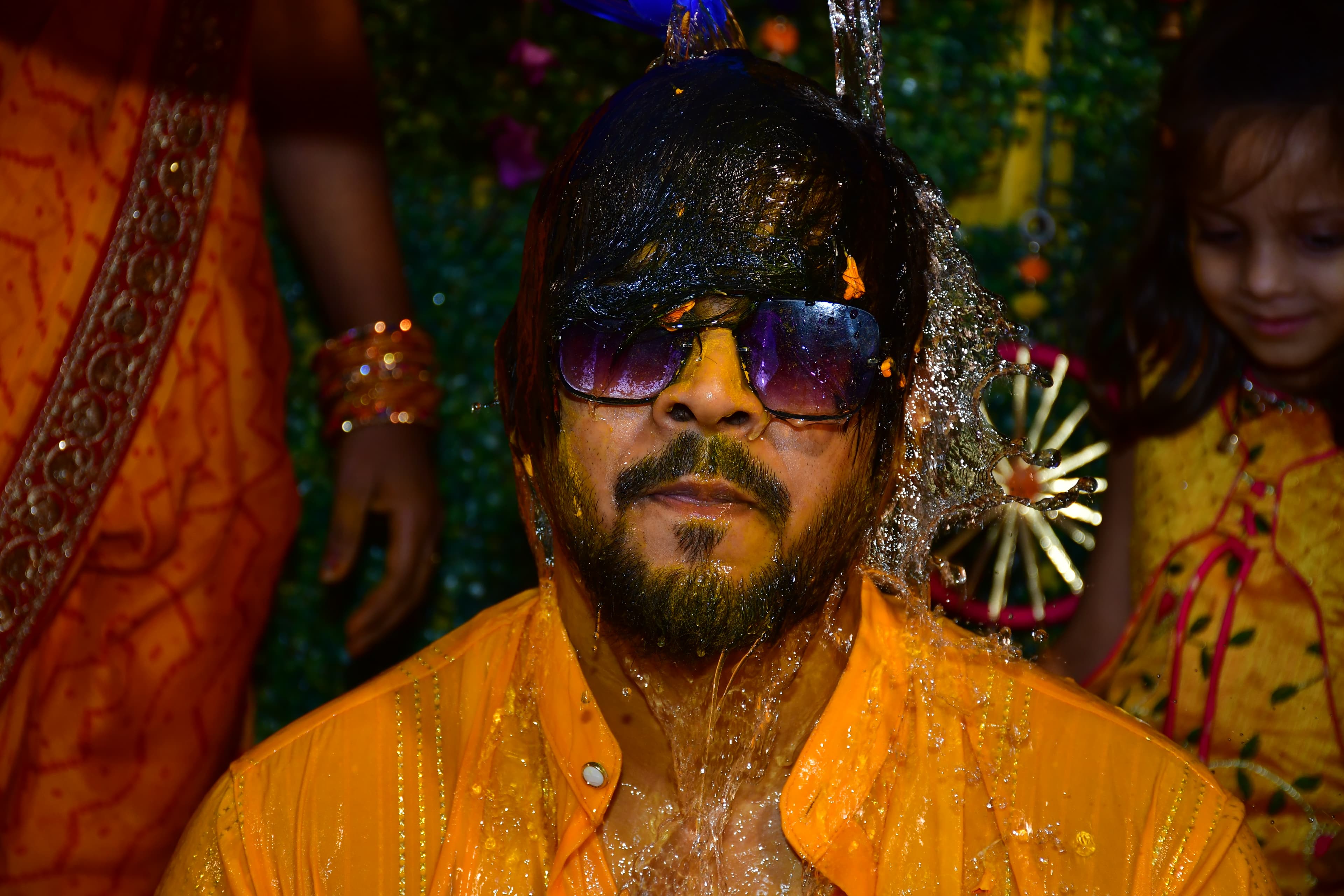 Dramatic photo of the couple under lighting