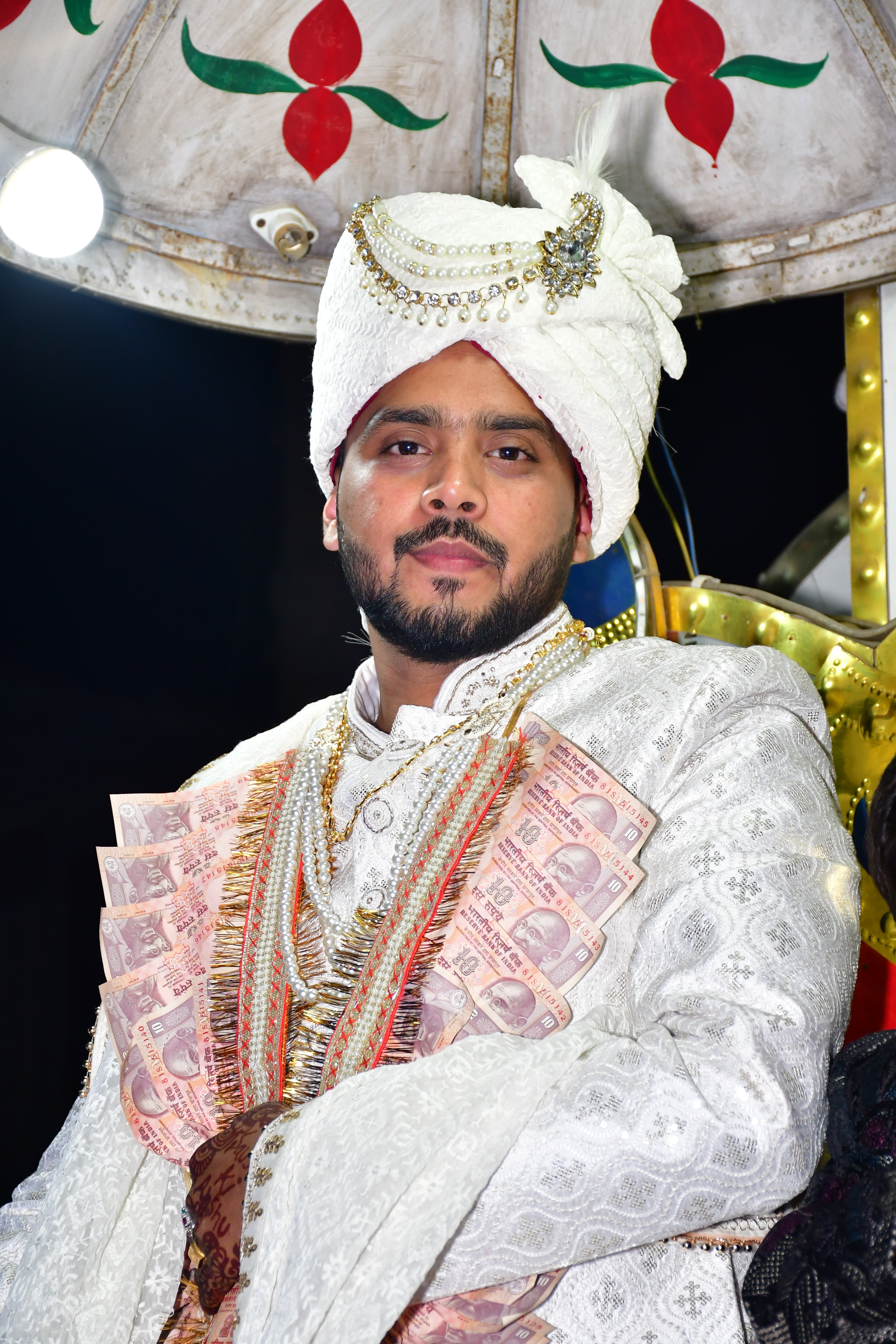 Couple seated at the mandap